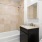 Bathroom with a large vanity and bath/shower combination